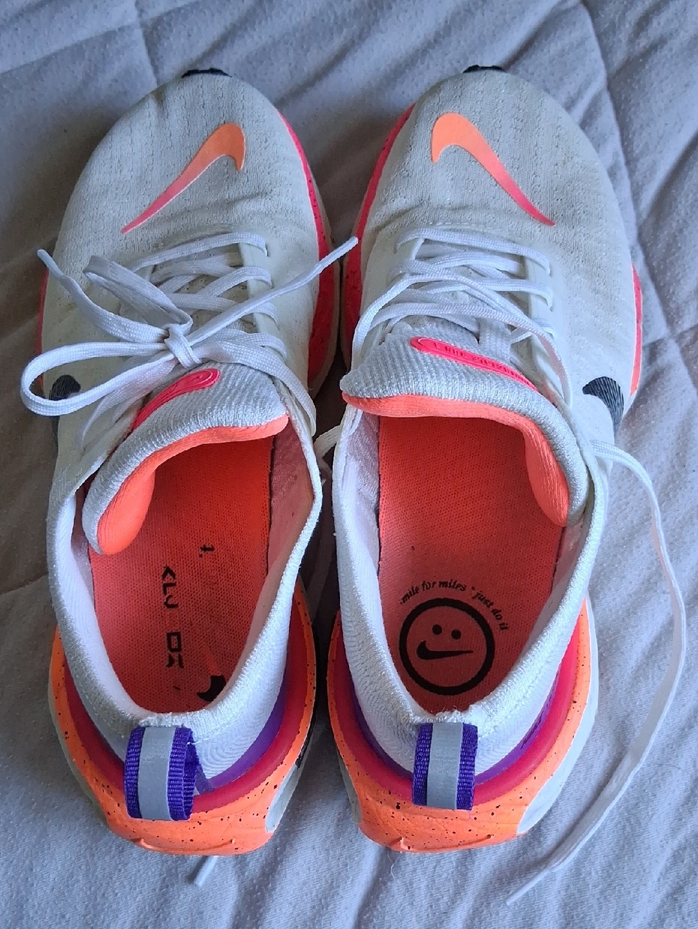Nike Kids White Sneakers with Neon Orange & Purple Accents
